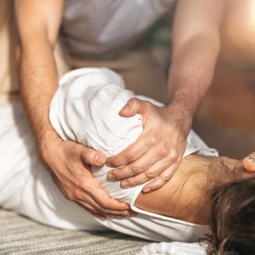 Thai massage therapist hands treatment